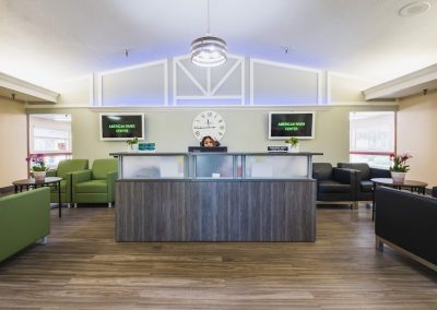 The front reception desk and lobby at the American River Center