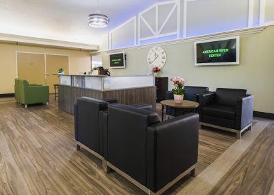 The front reception desk and lobby at the American River Center