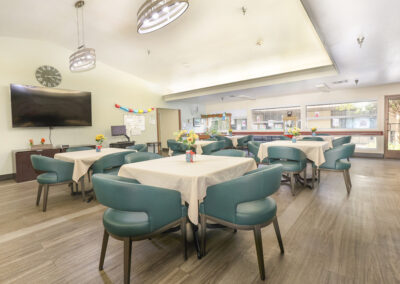 The dining room with blue chairs at American River